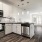 a kitchen with white cabinets