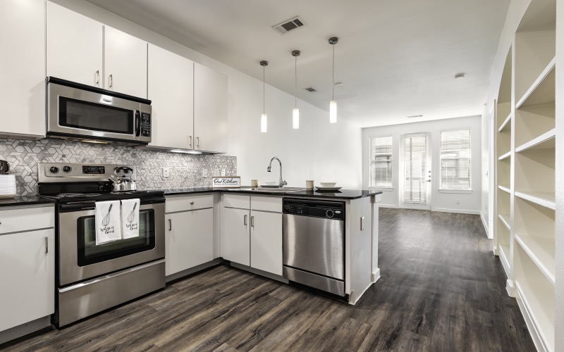 spacious upgraded kitchen at crescent apartments in austin